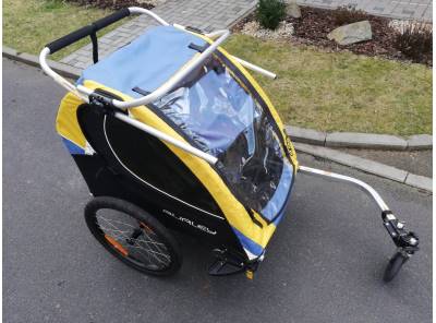 Dvoumístný odpružený dětský vozík za kolo