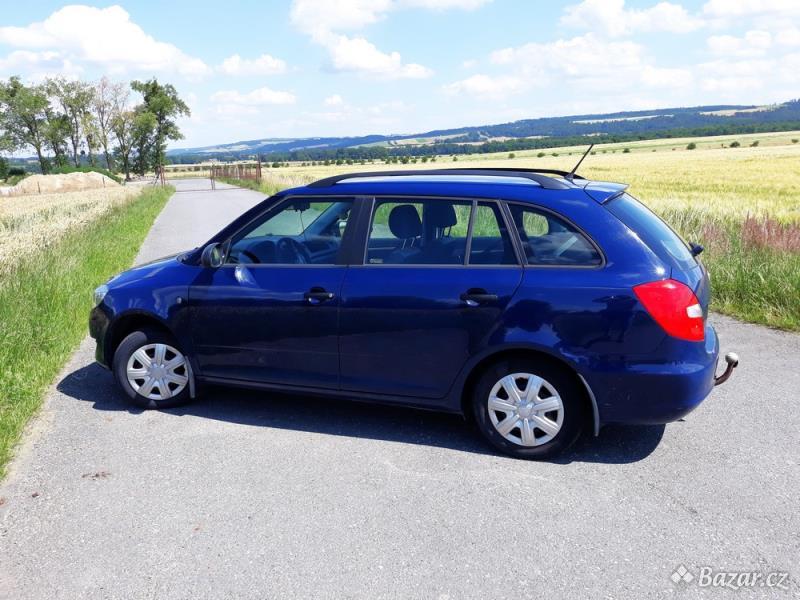 Fabia II Combi, benzin + LPG, tažné zařízení, 4 zimní pneu s disky, nové 2 přední pneu letní